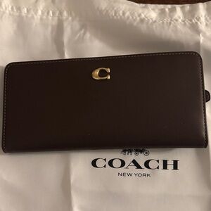 Coach Dark Brown Leather Clutch with Gold Accent